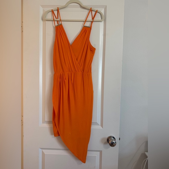 bebe Dresses & Skirts - Bebe Orange Asymmetrical Dress